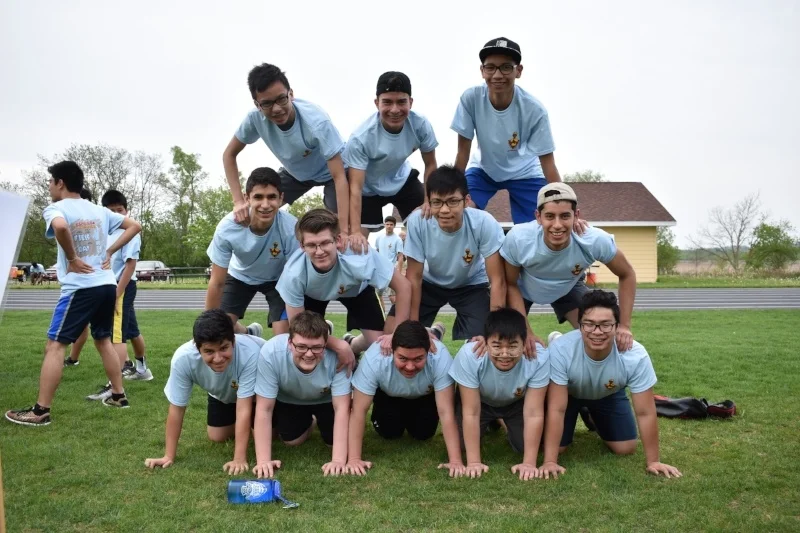 students making a human pyramid
