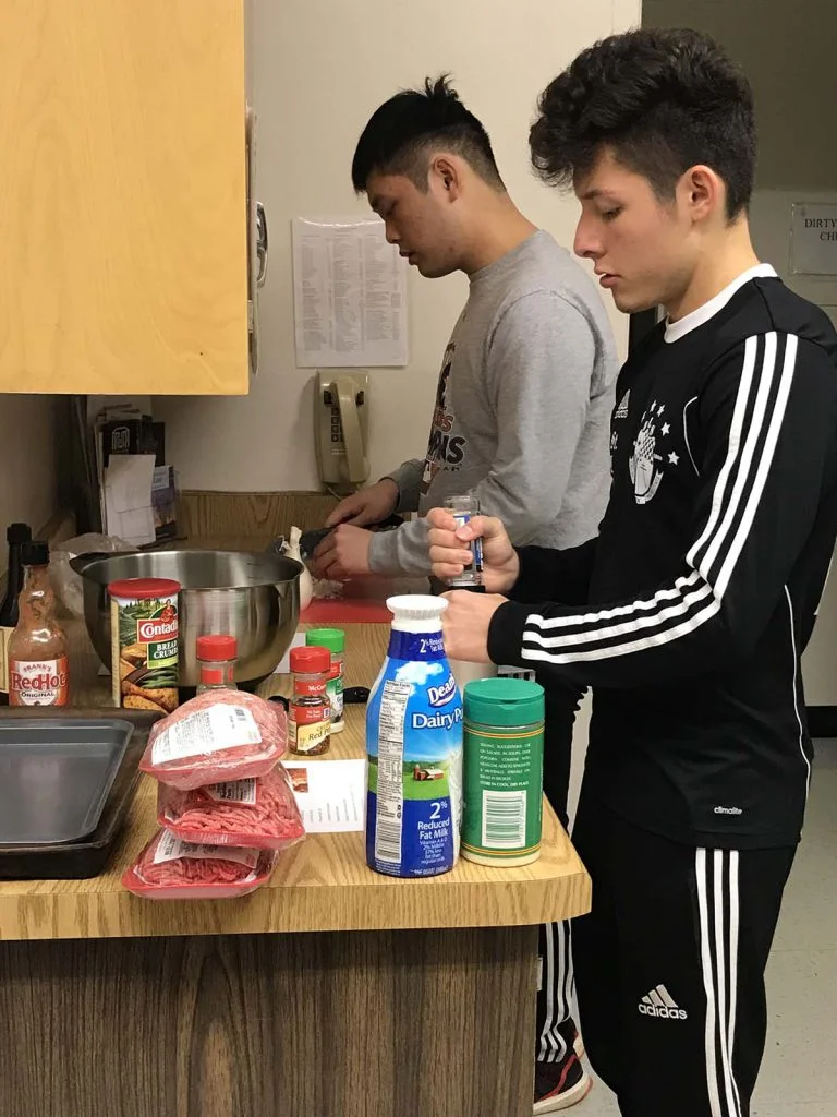students preparing food