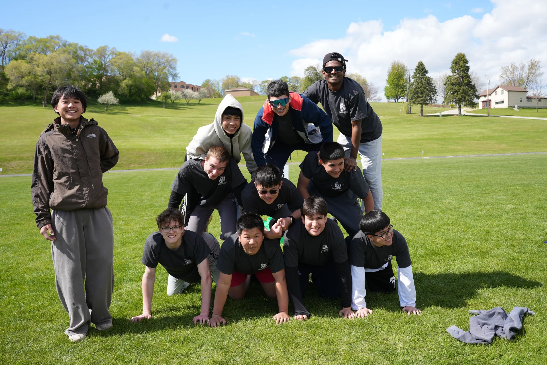 students making a human pyramid