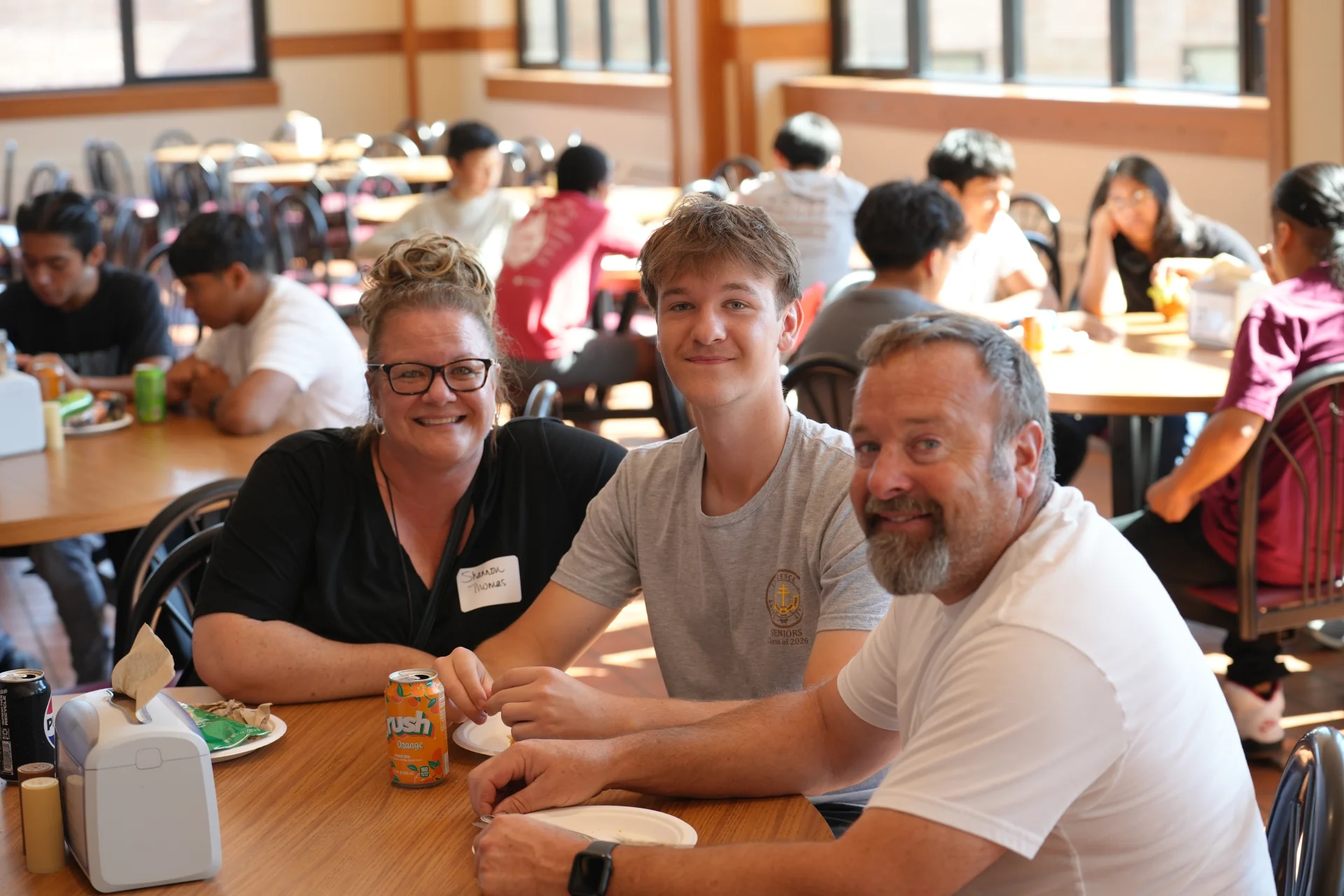 SLS student and parents smiling