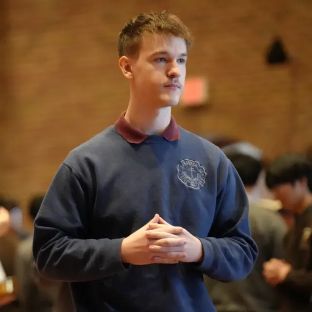 student in church praying