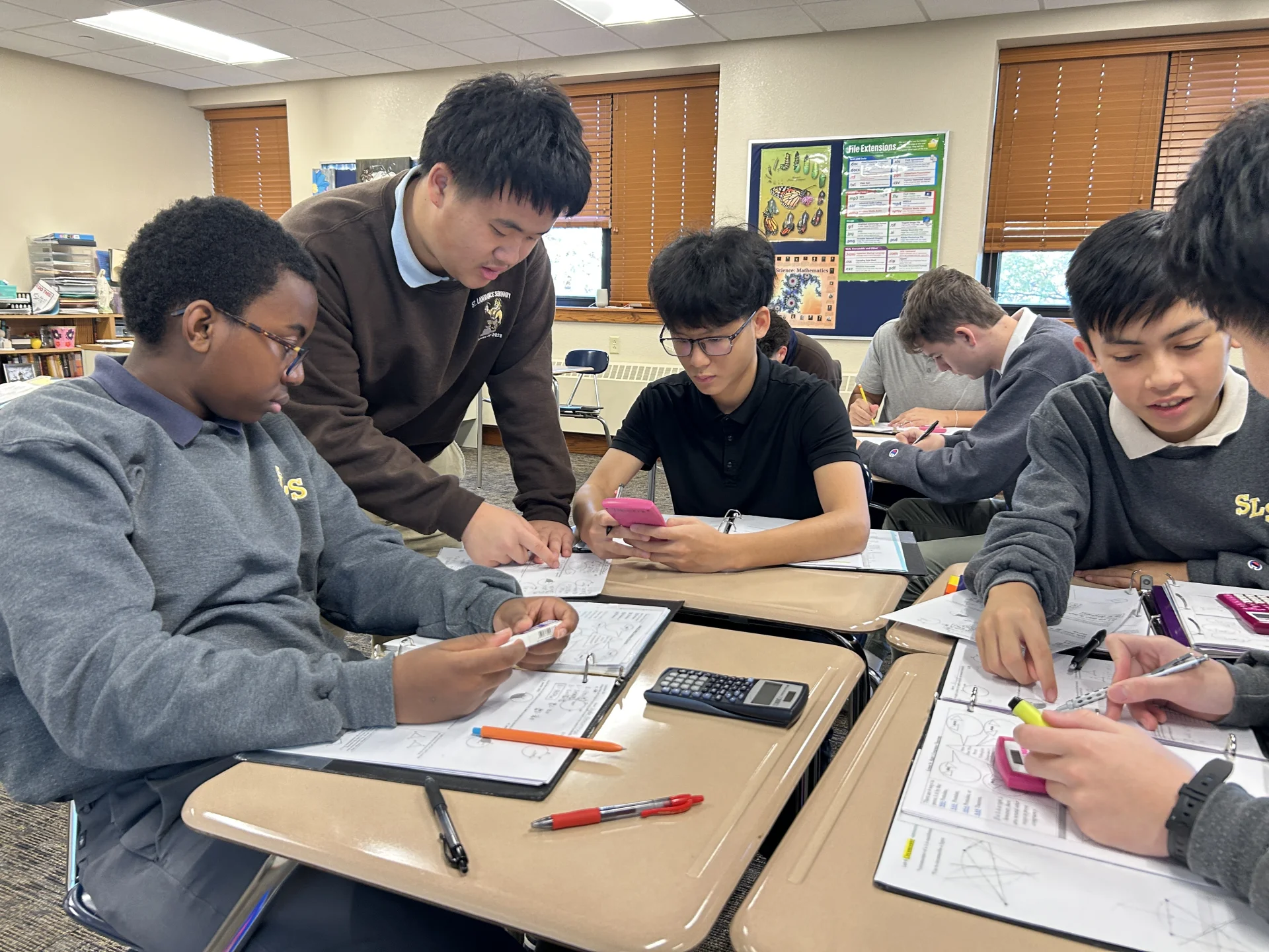 SLS students smiling in class